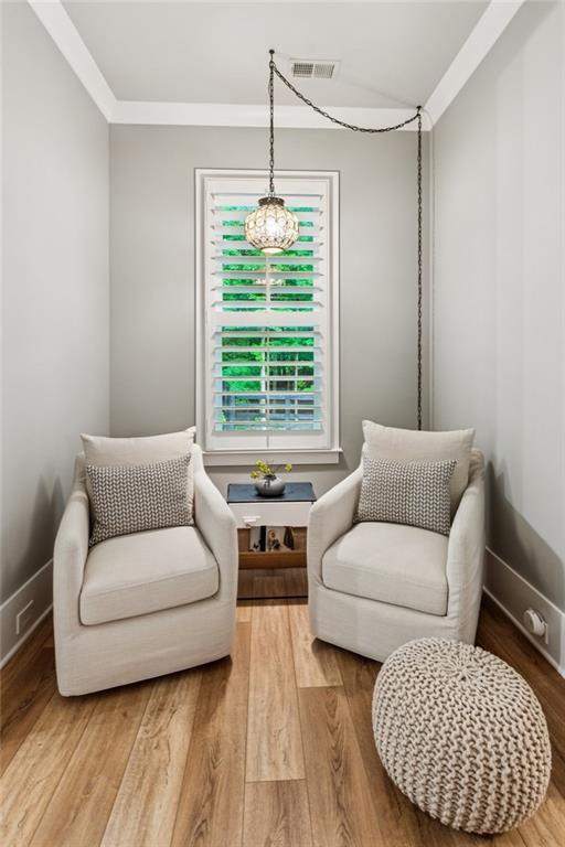 150 Trinity Farm Dr, Canton, GA 30115 - living area with wood finished floors and crown molding