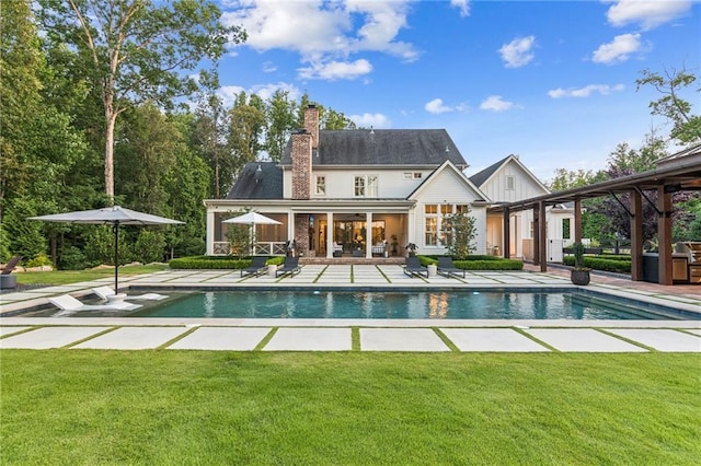 150 Trinity Farm Dr, Canton, GA 30115 - rear view of house with an exterior structure, an outdoor structure, a patio, a yard, and an outdoor pool