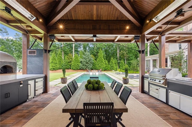 150 Trinity Farm Dr, Canton, GA 30115 - view of patio with area for grilling, a gazebo, outdoor dining area, an outdoor pool, and a ceiling fan
