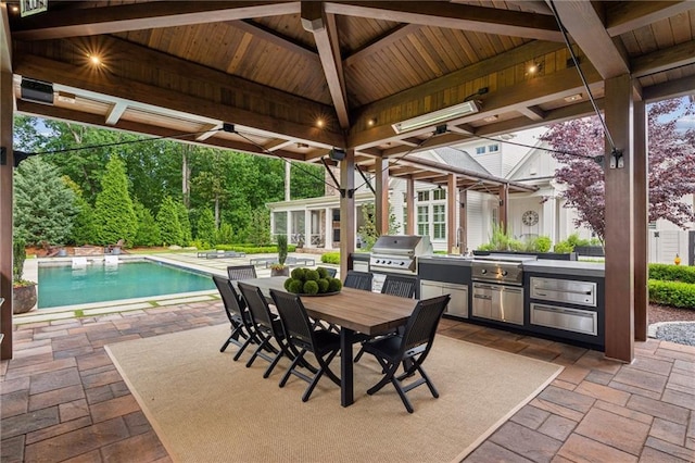 150 Trinity Farm Dr, Canton, GA 30115 - view of patio with an outdoor kitchen, an outdoor pool, ceiling fan, outdoor dining space, and a gazebo