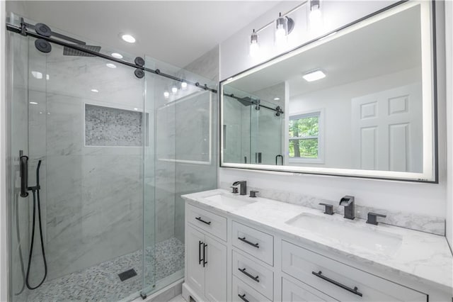 5961 John St, Austell, GA 30106 - bathroom featuring double vanity, a shower stall, and recessed lighting