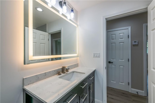 5961 John St, Austell, GA 30106 - bathroom with vanity and wood finished floors