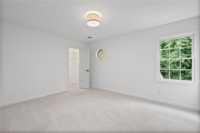 1017 Mill Creek Mnr NE, Brookhaven, GA 30319 - unfurnished room with baseboards and light colored carpet