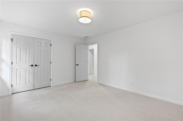 1017 Mill Creek Mnr NE, Brookhaven, GA 30319 - unfurnished bedroom with a closet and light carpet