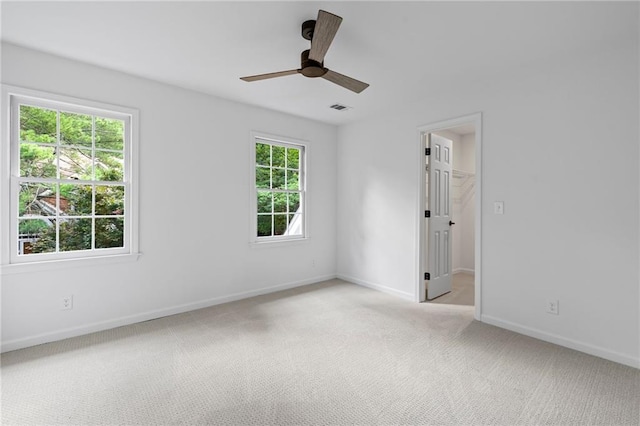 1017 Mill Creek Mnr NE, Brookhaven, GA 30319 - unfurnished room with light colored carpet and a ceiling fan
