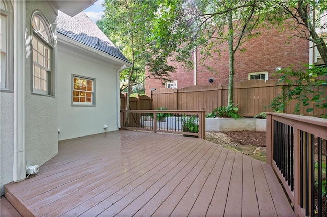 1017 Mill Creek Mnr NE, Brookhaven, GA 30319 - wooden terrace with a fenced backyard