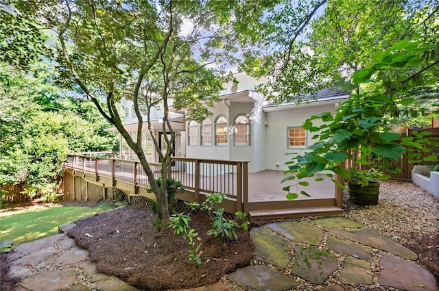 1017 Mill Creek Mnr NE, Brookhaven, GA 30319 - rear view of house featuring a wooden deck and stucco siding