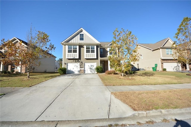 view of front facade with a garage, driveway, board and batten siding, and a front yard