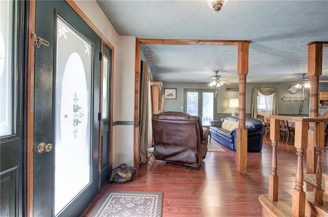90 Wiley Dr, Douglasville, GA 30134 - entryway featuring a ceiling fan, wood finished floors, and a textured ceiling