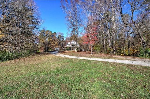 90 Wiley Dr, Douglasville, GA 30134 - view of grassy yard with a view of trees