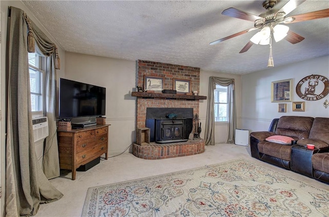 90 Wiley Dr, Douglasville, GA 30134 - carpeted living room featuring a textured ceiling and a ceiling fan