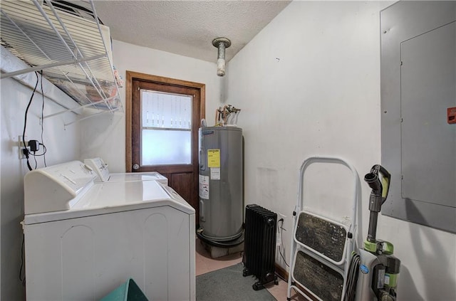 90 Wiley Dr, Douglasville, GA 30134 - laundry room with electric water heater, washer and clothes dryer, electric panel, a textured ceiling, and radiator heating unit