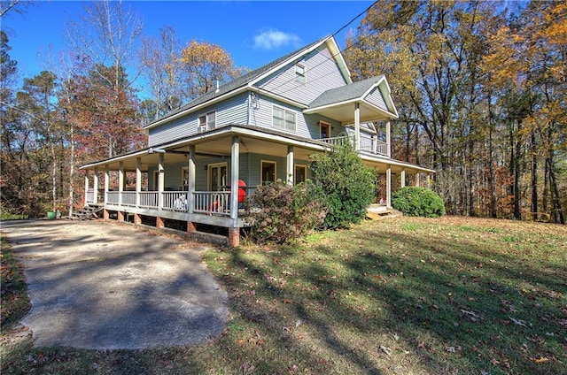 90 Wiley Dr, Douglasville, GA 30134 - view of front facade featuring a porch, a front lawn, and driveway