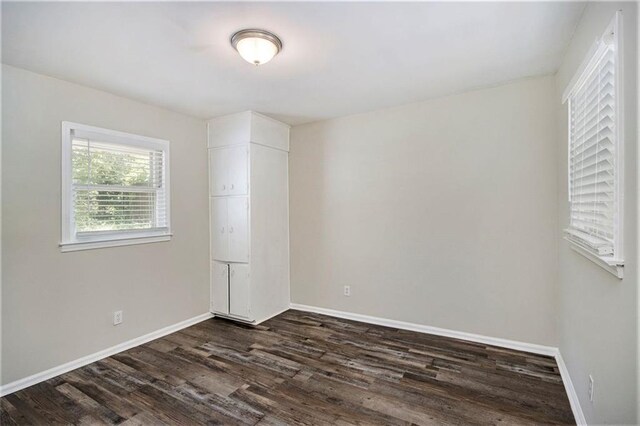 3436 Dodson Ter, Atlanta, GA 30344 - spare room with dark wood-style floors and baseboards