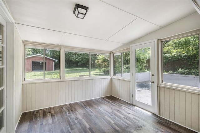 3436 Dodson Ter, Atlanta, GA 30344 - unfurnished sunroom featuring vaulted ceiling, wood finished floors, and plenty of natural light