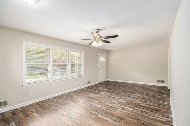 3436 Dodson Ter, Atlanta, GA 30344 - unfurnished room featuring wood finished floors, a ceiling fan, and baseboards