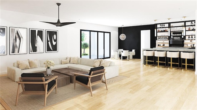 living room featuring ceiling fan and light hardwood / wood-style floors