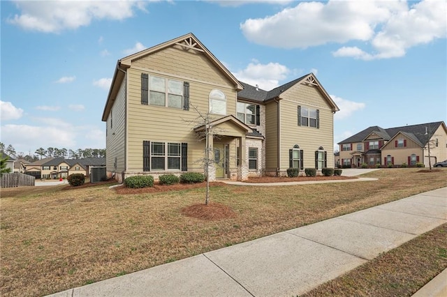 craftsman inspired home with central AC and a front yard