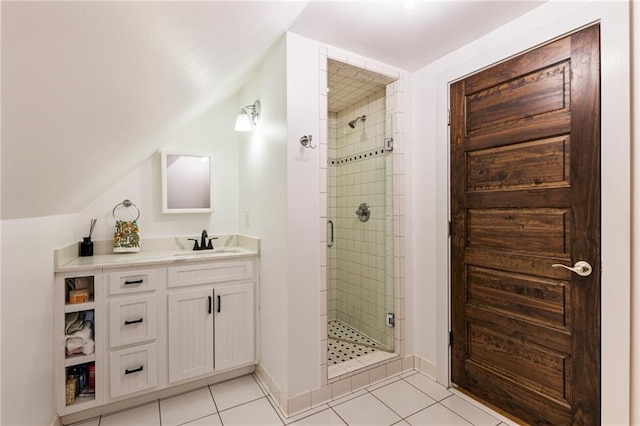 527 Main St, Suwanee, GA 30024 - bathroom featuring a shower stall, tile patterned flooring, vanity, and vaulted ceiling