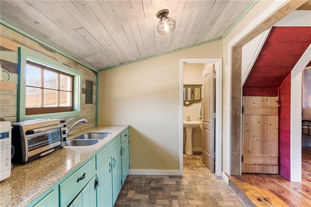 527 Main St, Suwanee, GA 30024 - kitchen featuring brick patterned floors, wooden ceiling, ornamental molding, light stone countertops, and white microwave