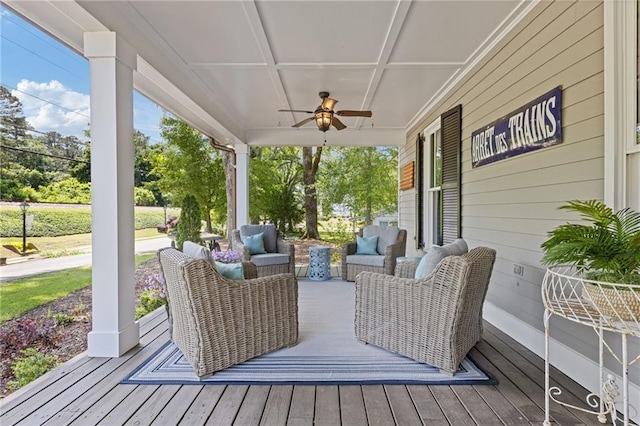 527 Main St, Suwanee, GA 30024 - wooden porch featuring a ceiling fan and an outdoor hangout area