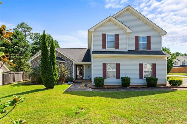 view of front property featuring a front lawn