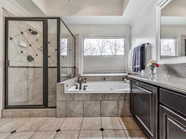 full bath with plenty of natural light, a shower stall, a bath, and crown molding