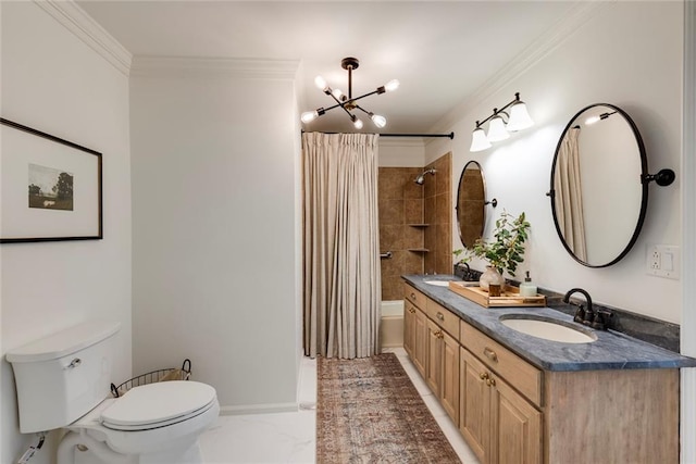 full bath featuring ornamental molding, a sink, toilet, and baseboards