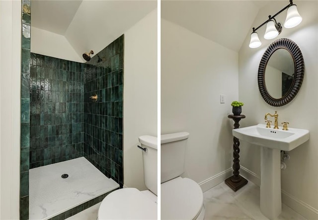 bathroom with vaulted ceiling, a tile shower, and toilet