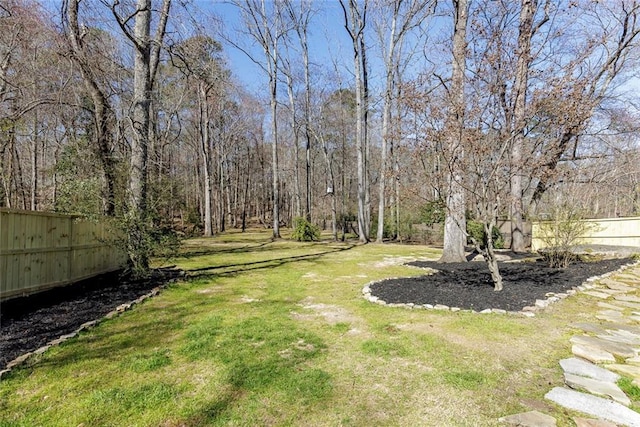 view of yard with fence