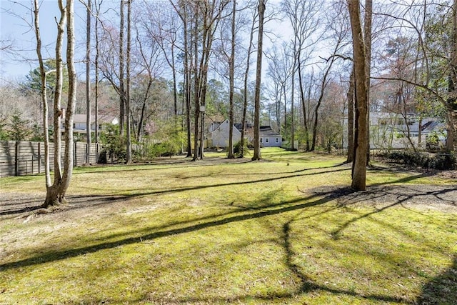 view of yard with fence