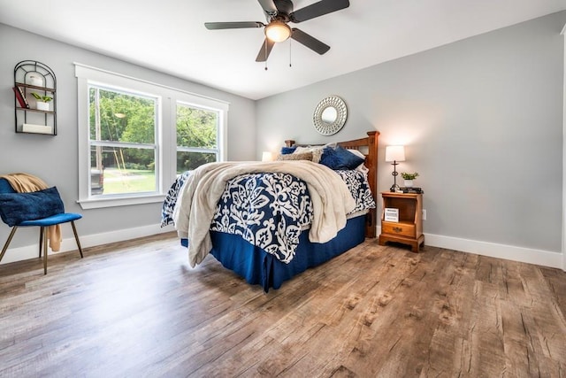 661 Inglewood Dr SE, Smyrna, GA 30080 - bedroom featuring wood finished floors, baseboards, and a ceiling fan