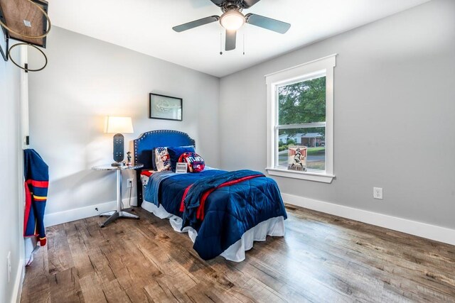 661 Inglewood Dr SE, Smyrna, GA 30080 - bedroom featuring wood finished floors, baseboards, and ceiling fan