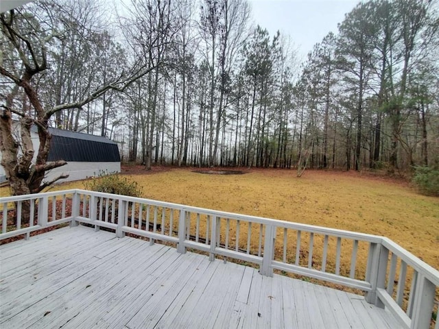 deck featuring a lawn