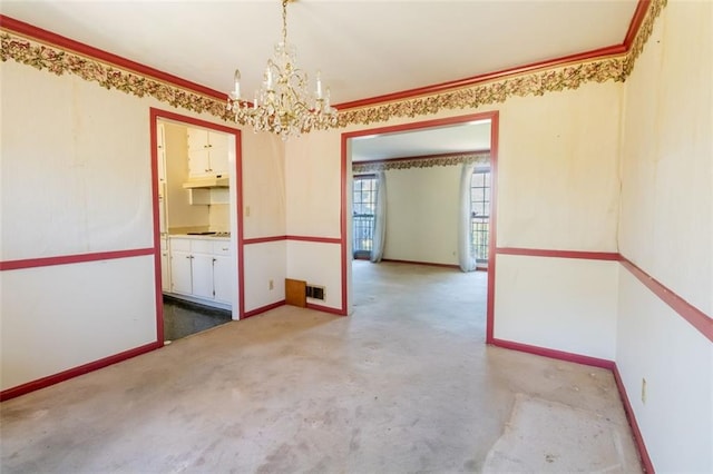 spare room with crown molding, visible vents, baseboards, and a notable chandelier