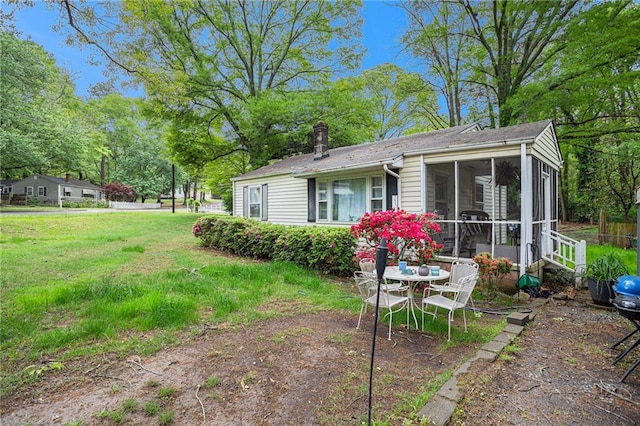 exterior space with a sunroom