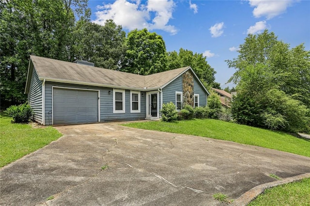 1050 Chapman Cir, Stone Mountain, GA 30088 - ranch-style house with an attached garage, driveway, a front yard, and a chimney