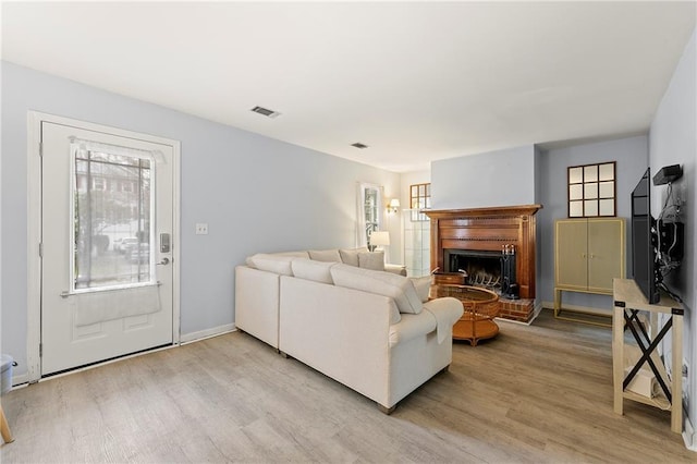 living room featuring light wood-type flooring