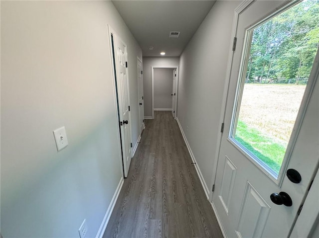 1341 E Atlanta Rd E, Stockbridge, GA 30281 - hallway with dark wood-style flooring and baseboards