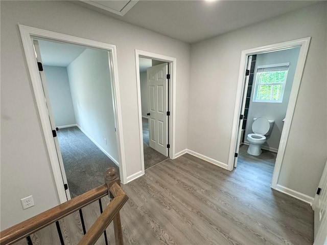 1341 E Atlanta Rd E, Stockbridge, GA 30281 - hallway with wood finished floors and baseboards