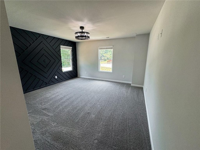 1341 E Atlanta Rd E, Stockbridge, GA 30281 - carpeted spare room with baseboards