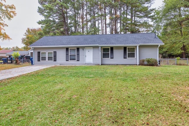 single story home featuring a front yard