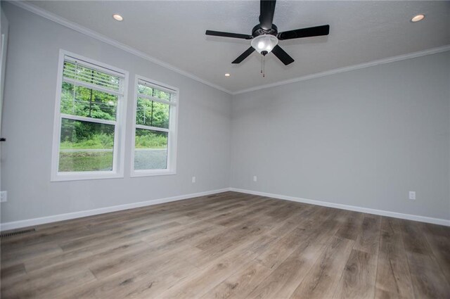 74 Preacher Smith Rd, Silver Creek, GA 30173 - empty room featuring wood finished floors, baseboards, ornamental molding, recessed lighting, and ceiling fan
