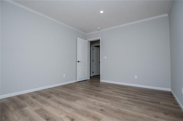 74 Preacher Smith Rd, Silver Creek, GA 30173 - spare room with baseboards, crown molding, wood finished floors, and recessed lighting