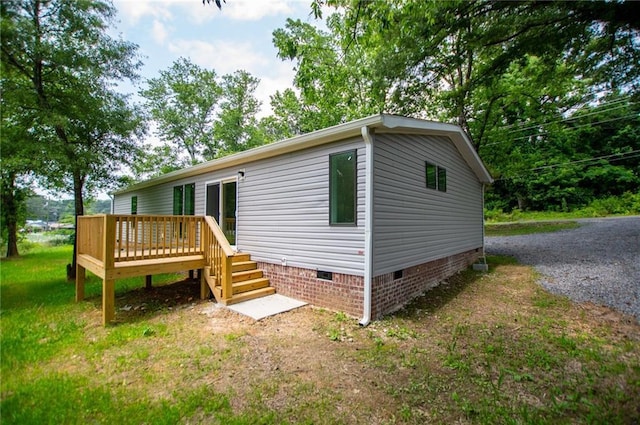 74 Preacher Smith Rd, Silver Creek, GA 30173 - back of house featuring crawl space and a deck