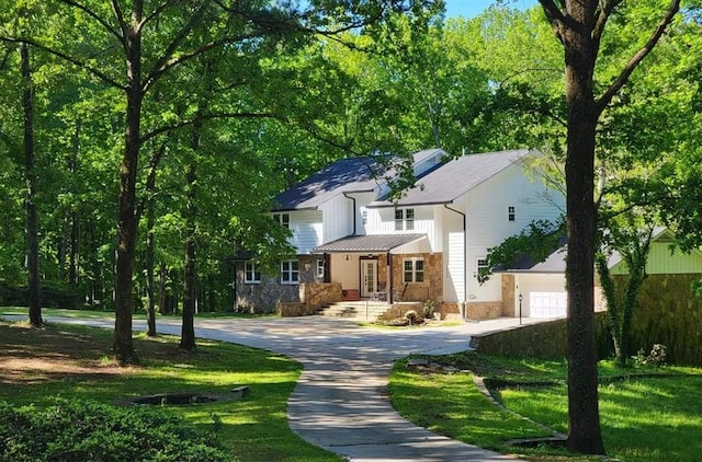2900 Orchard Rd SW, Conyers, GA 30094 - view of front of property featuring concrete driveway, a garage, and a front yard