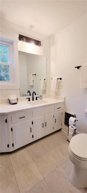 2900 Orchard Rd SW, Conyers, GA 30094 - bathroom with vanity, tile patterned floors, and toilet