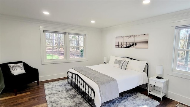 2900 Orchard Rd SW, Conyers, GA 30094 - bedroom with ornamental molding, dark wood-style floors, baseboards, and recessed lighting