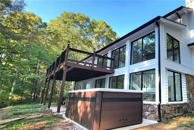 2900 Orchard Rd SW, Conyers, GA 30094 - view of side of property featuring a wooden deck and stone siding