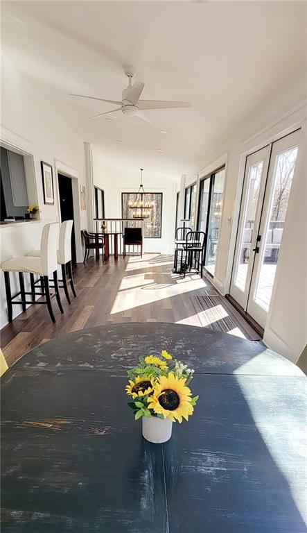 2900 Orchard Rd SW, Conyers, GA 30094 - sunroom / solarium with french doors and a chandelier